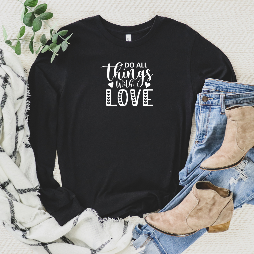 Do al things with love long sleeve tee written in white 