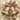 Decorative image of two gold bells with a red ribbon and Christmas elements on a textured background.