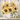 yellow flowers in white basket