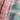 pastel lumbar pillow with pink fringe
