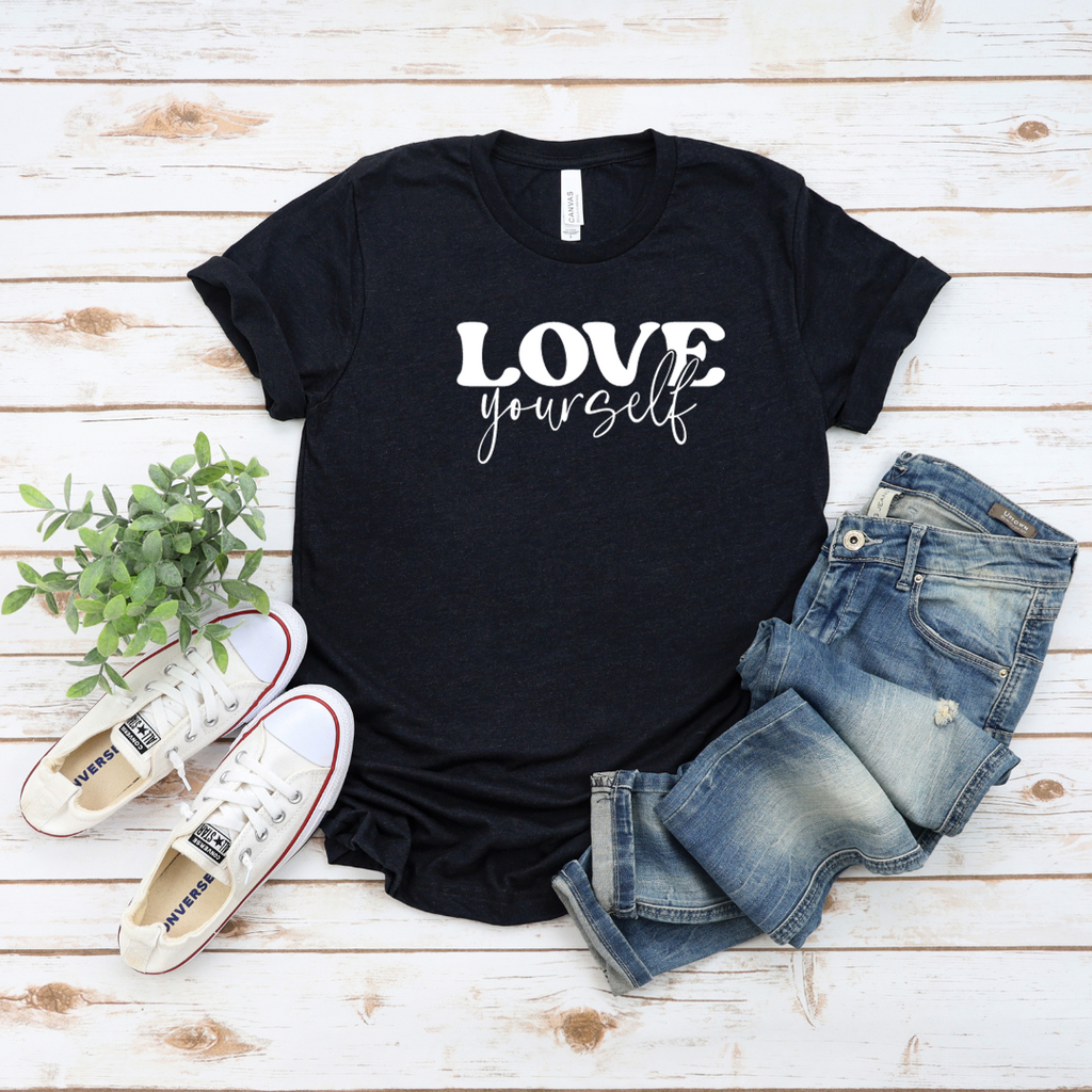 black tee with white love yourself printed on front