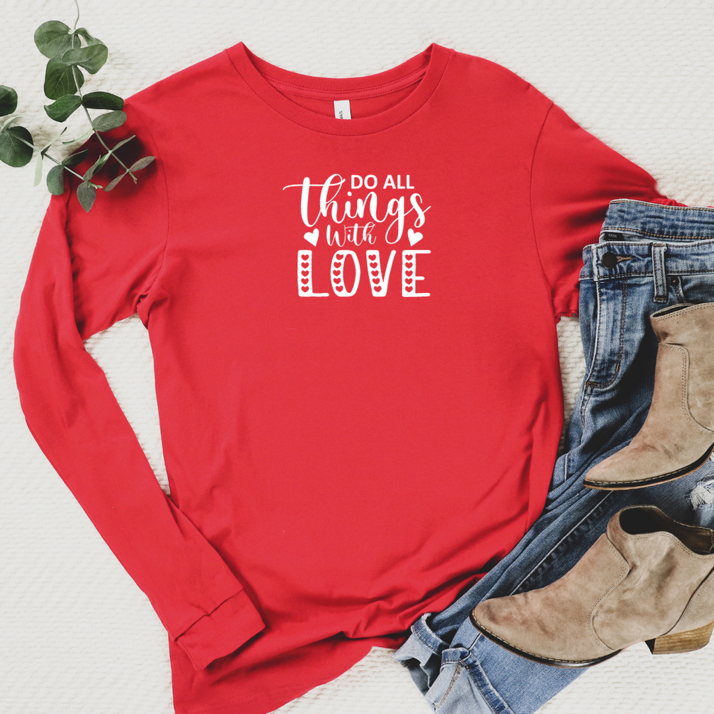 Long sleeve red tee with do all things with love in white on front