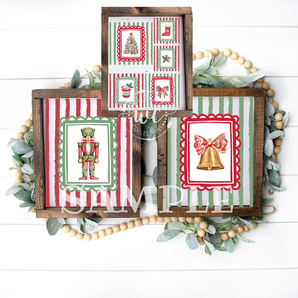 Set of Christmas-themed wall art pieces on a wooden frame with decorative elements.