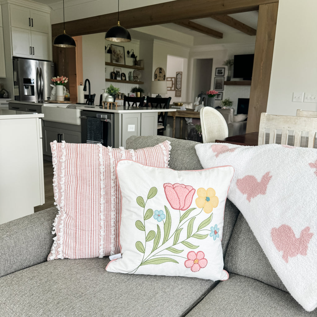 Spring Floral Pillow Cover by Wilshire Collections styled on couch
