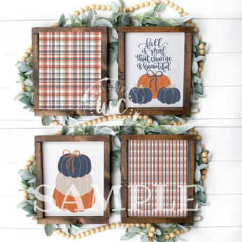 Set of four framed prints with autumn-themed designs on a decorative background.
