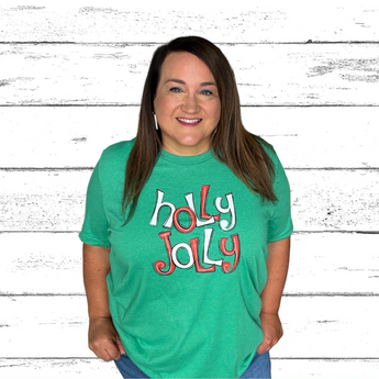 Holly Jolly t shirt in white and red text on green shirt