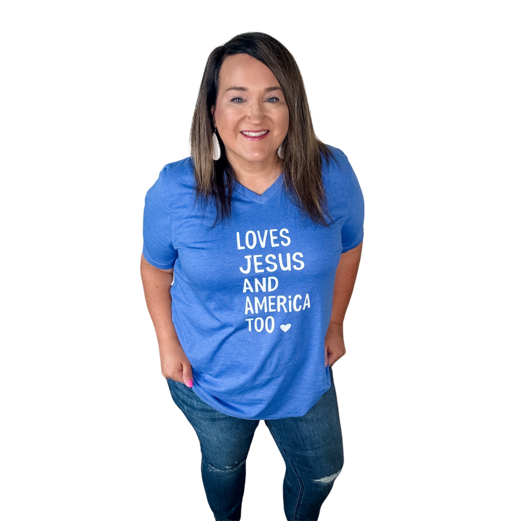 Blue v neck shirt with Loves Jesus and America Too written on front in white