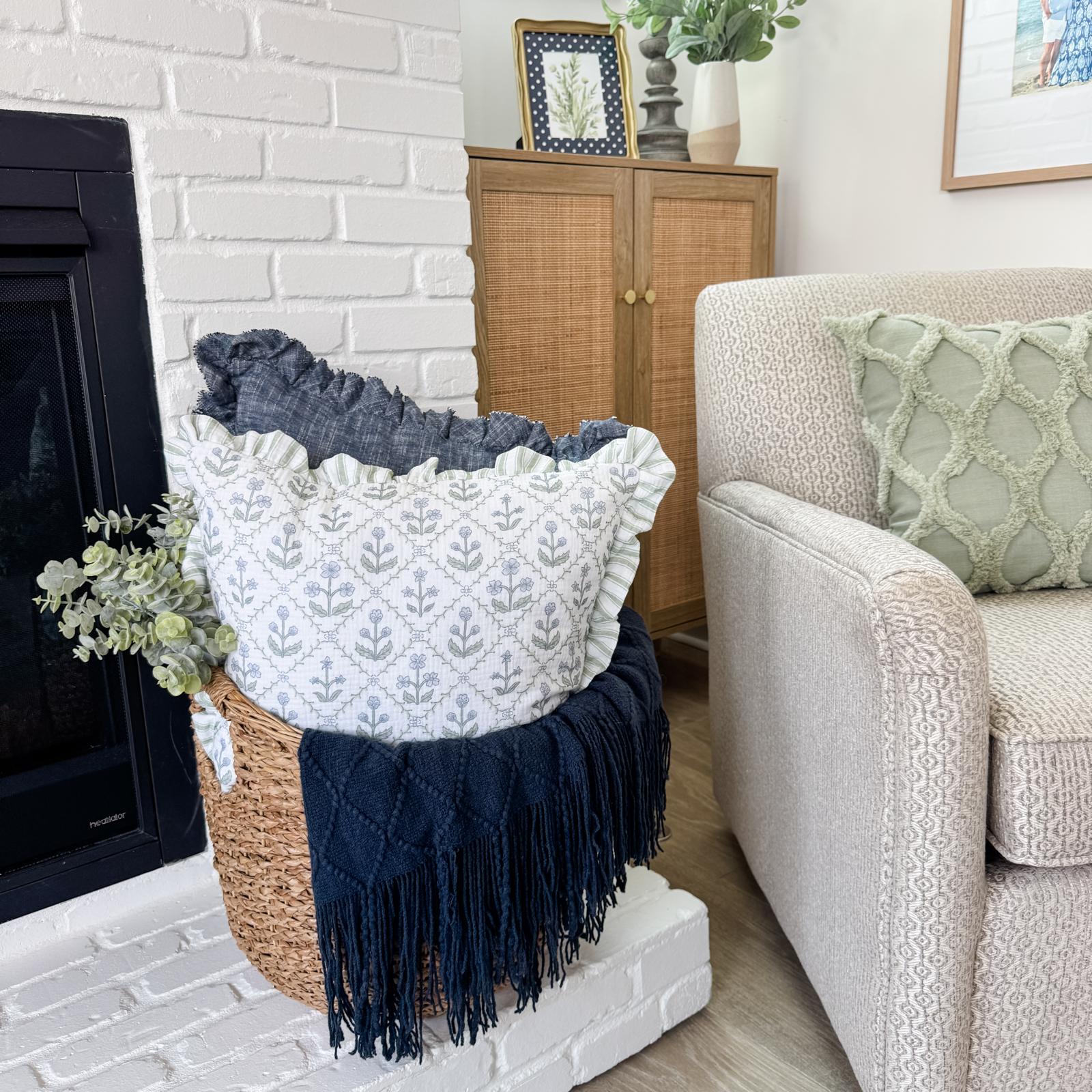 navy throw styled in basket for spring