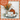 Decorative tray with pumpkins, flowers, and a framed picture on a plaid background