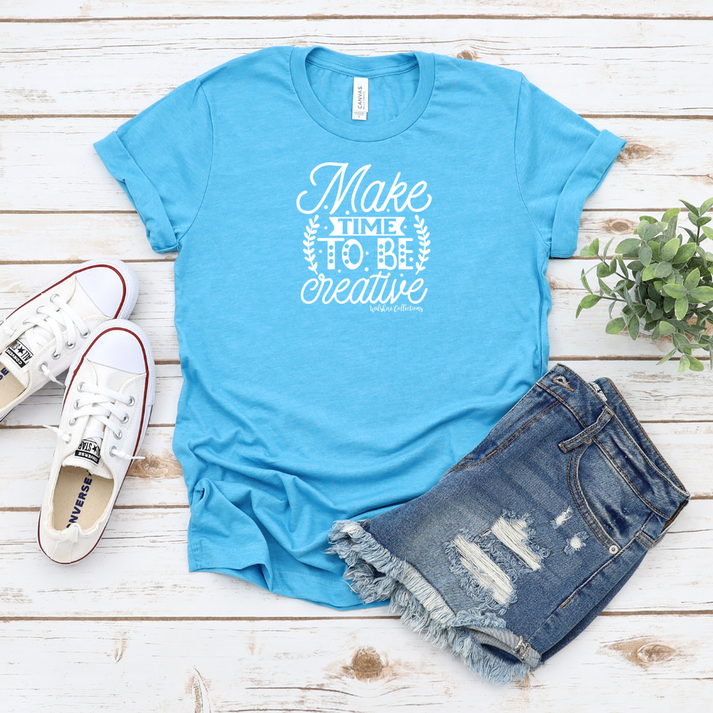 blue crew neck t shirt with saying: Make time to be creative