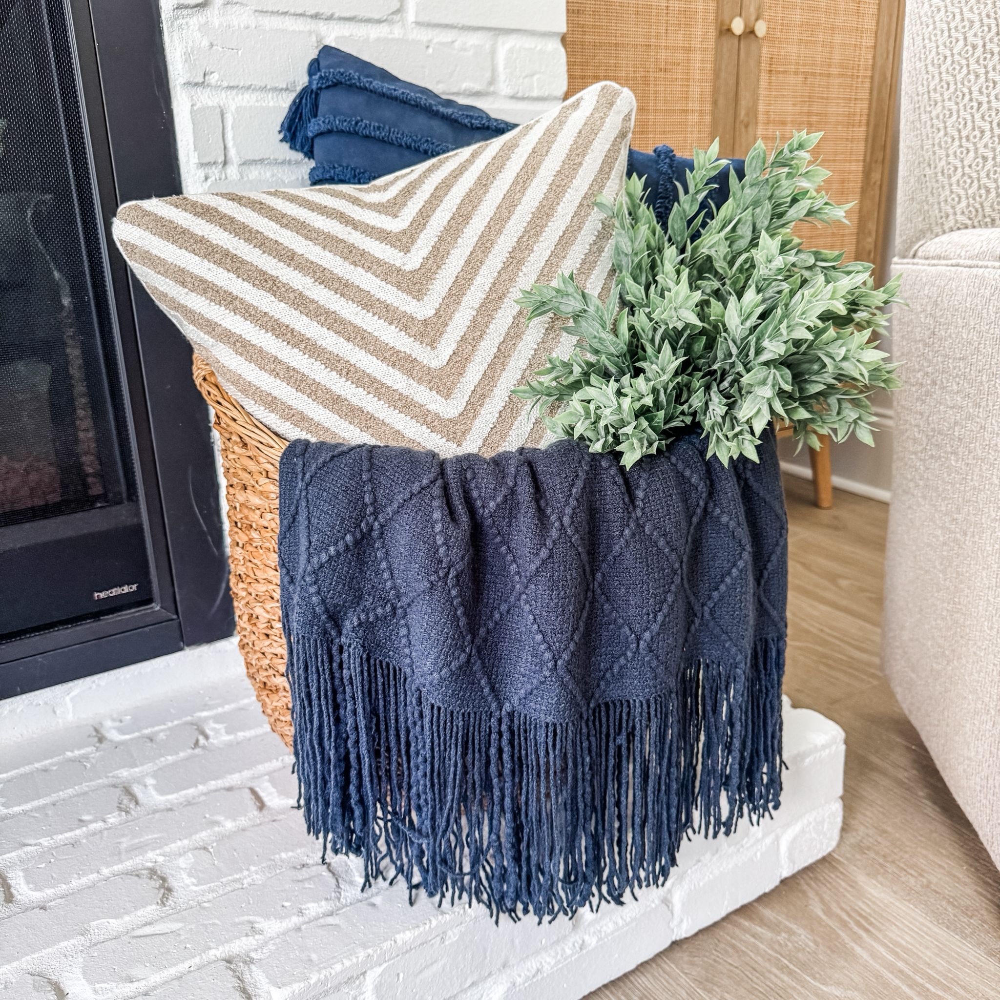 navy throw styled in basket for everyday decor